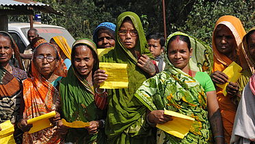 Women assemble at an eye camp conducted by CBM partner in Nepal - the Biratnagar Eye Hospital. 