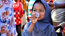 Hayate Habib Shifa receiving a dose of Zithromax® syrup as part of the Mass Drug Administration <br/>(MDA) campaign for trachoma elimination in Misrak Silti District, Ethiopia.