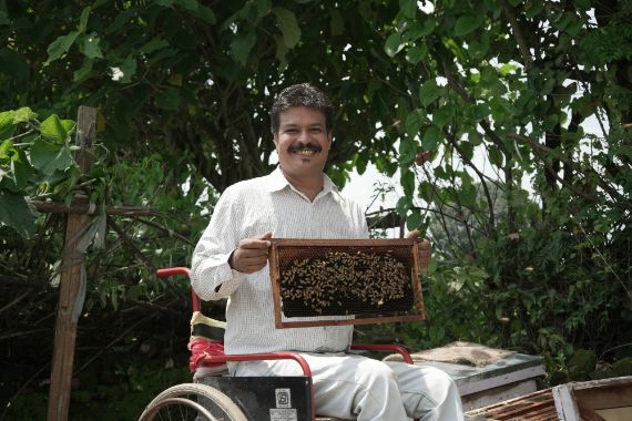 Ashish, 33, built a beekeeping business through the Atmanirbhar Shamoodhay initiative with support from CBM India and Sanjeevani. He now earns his own income, supports others, and speaks up for stronger social protection.
