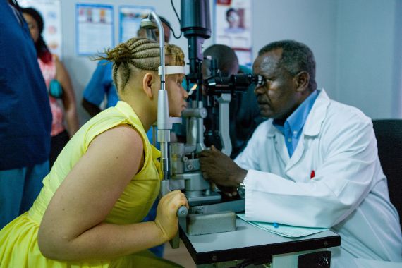 A teenage girls getting eye examination