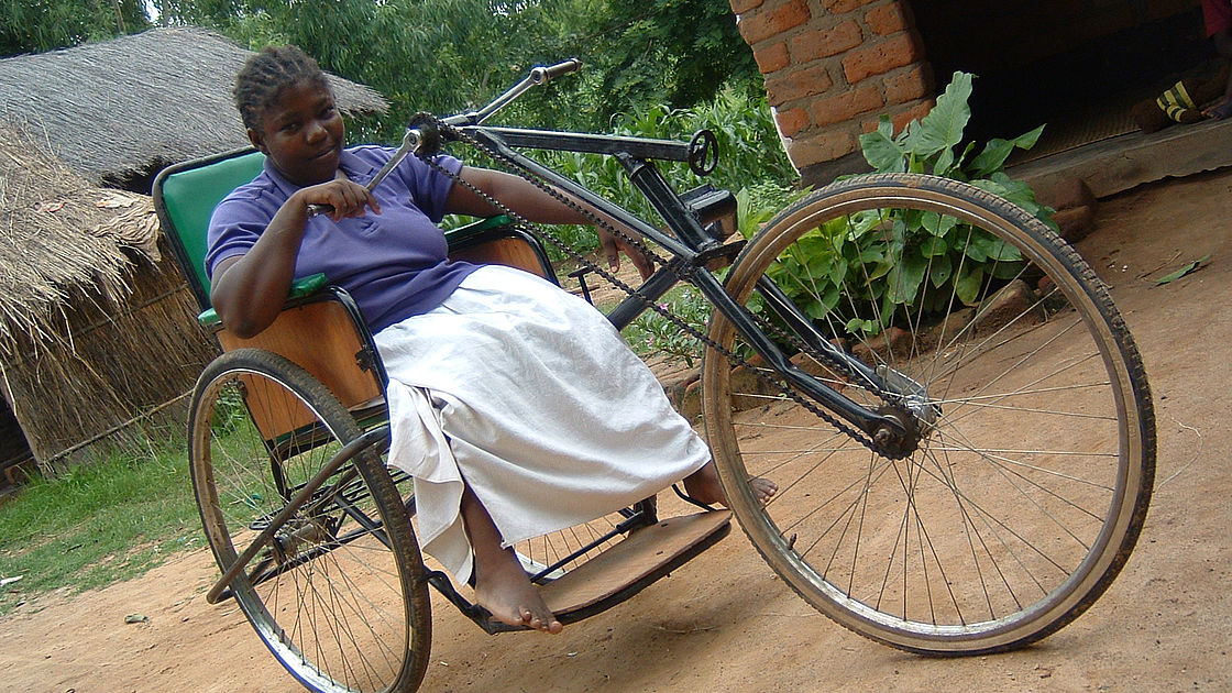 Evelyn Mouzungo with her tricycle